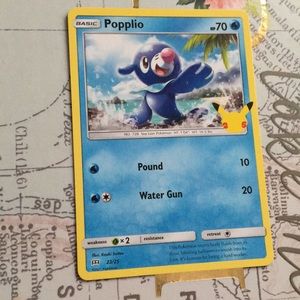 Non holographic Popplio, Pokémon card.